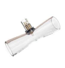 Tilted clear glass tube with a small metal valve/adapter attached mid‑length.