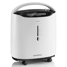 White two-slice toaster with a black control panel on top and small caster wheels on the base, compact and modern in design.