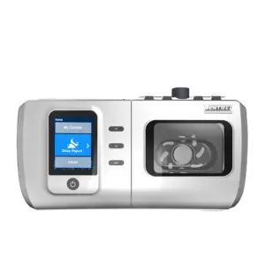 H78531db89bf94c9ebc8c32616a3dee2cP – مصر ميديكال White medical sleep therapy device with a blue touchscreen display on the left and a round humidifier chamber on the right.