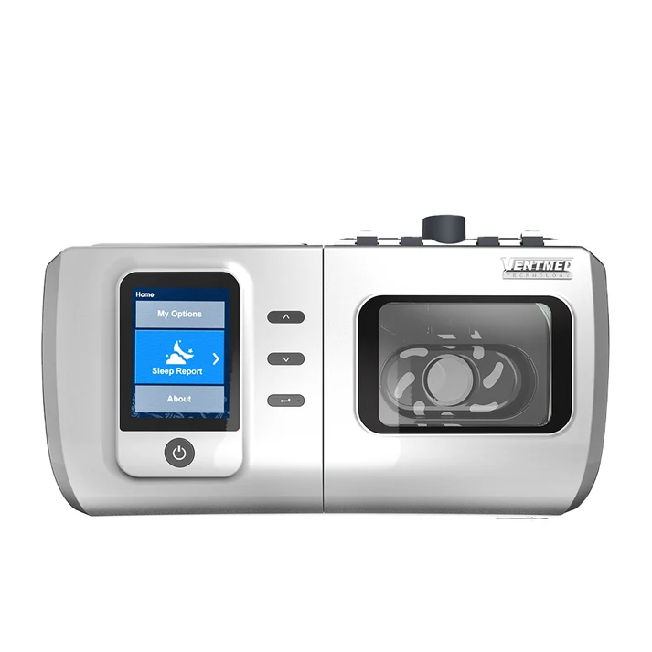 White medical sleep therapy device with a blue touchscreen display on the left and a round humidifier chamber on the right.