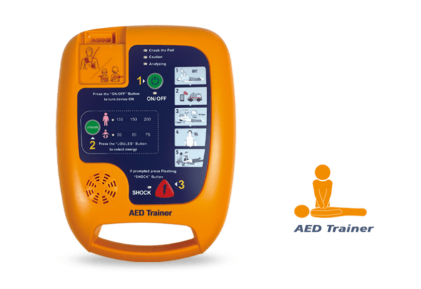 Screenshot 2026-08-23 161235 – مصر ميديكال Orange AED trainer device with instructional panel and a CPR logo labeled AED Trainer.
